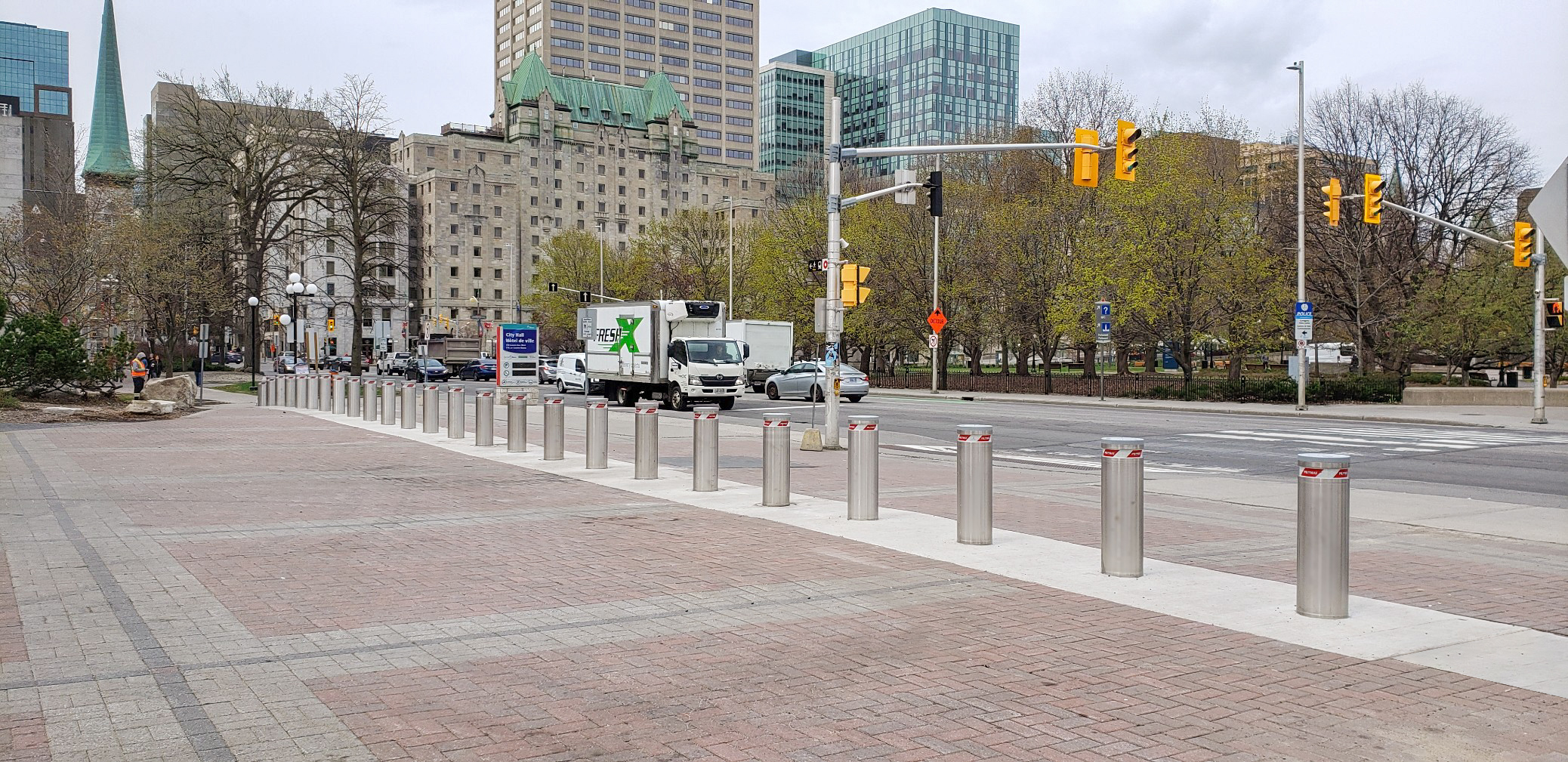 Image of fixed bollards installed to protect a square from the road traffic